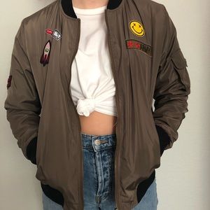 Super cute jacket with cool patches.